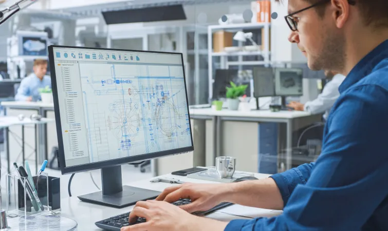 an engineer designing on a computer